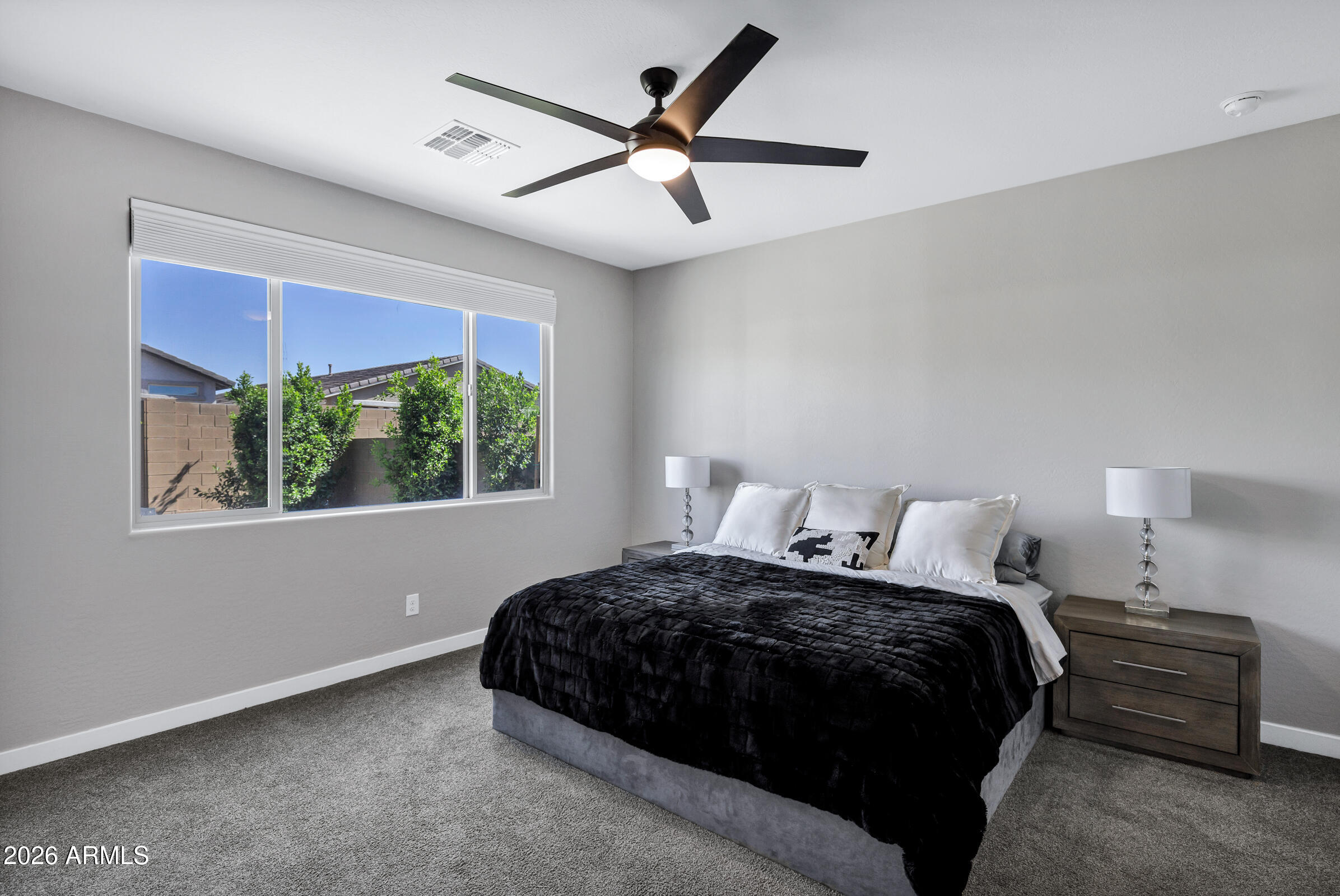 12243 East Sereno Road Gold Canyon, AZ 85118 - Photo 17 of 37 a bedroom with a bed and a window