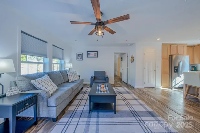 a living room with furniture and a rug