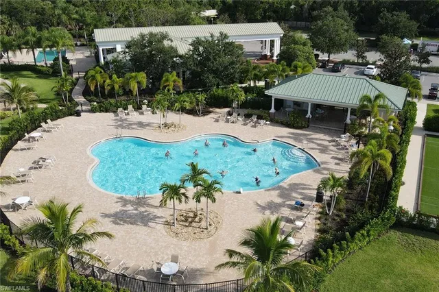 an aerial view of a house with garden space and sitting space