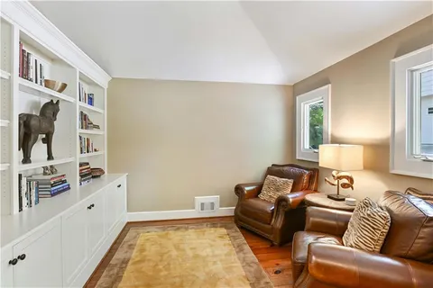 a living room with furniture and a couch