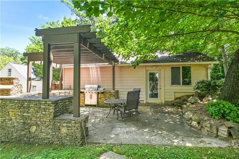 an outdoor view of garden with patio