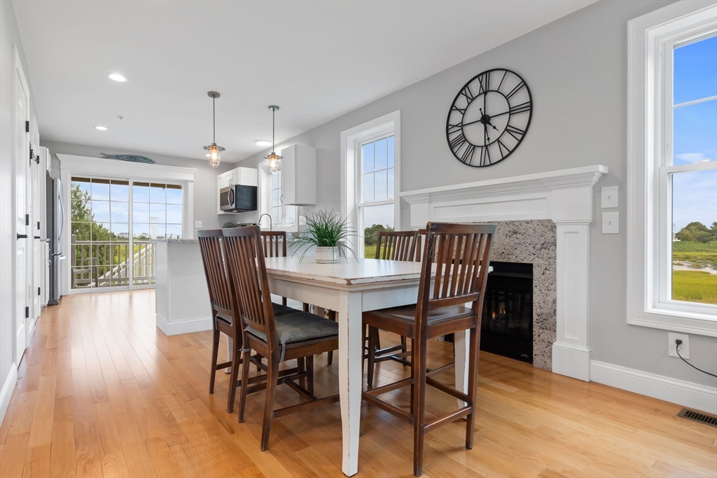 45 Old County Road, Unit 1 Salisbury, MA 01952 - Photo 26 of 40 a view of a dining room with furniture window and wooden floor