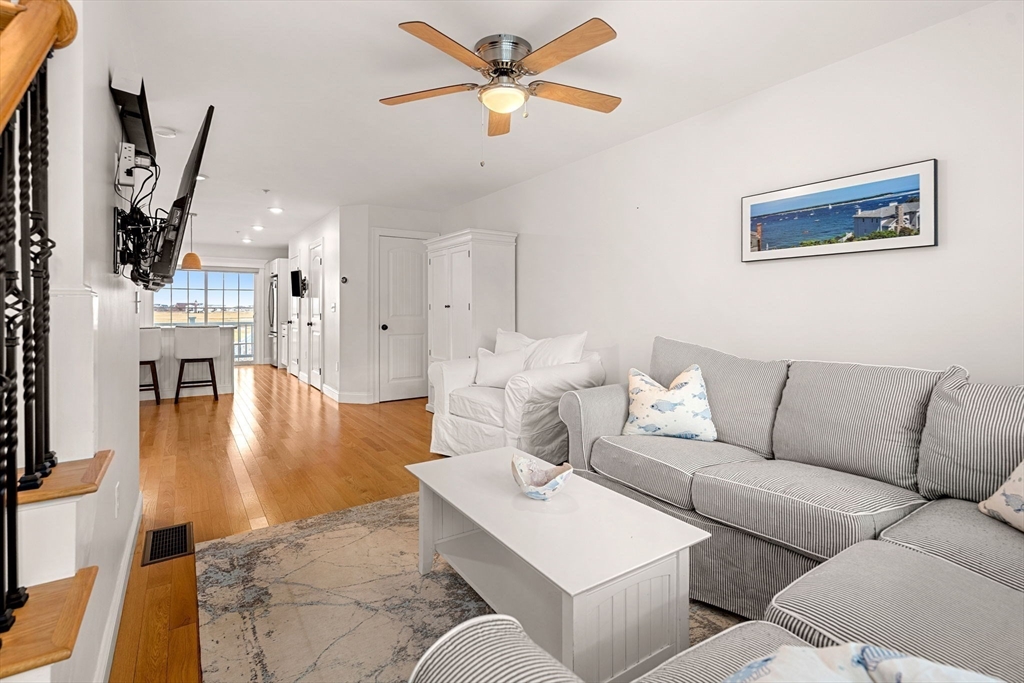 45 Old County Road, Unit 1 Salisbury, MA 01952 - Photo 10 of 40 a living room with furniture and a large window