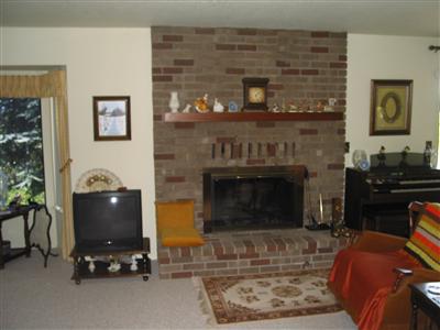 232 Pleasant Hill Road Sebastopol, CA 95472 - Photo 5 of 7 a living room with furniture and a fireplace