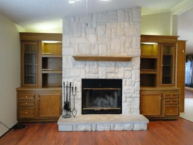 a living room with a fireplace