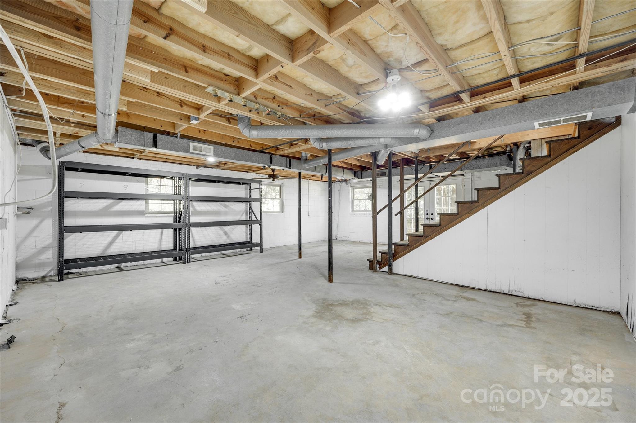 2001 Lakeview Drive Pineville, NC 28134 - Photo 25 of 35 a view of an empty room with a staircase