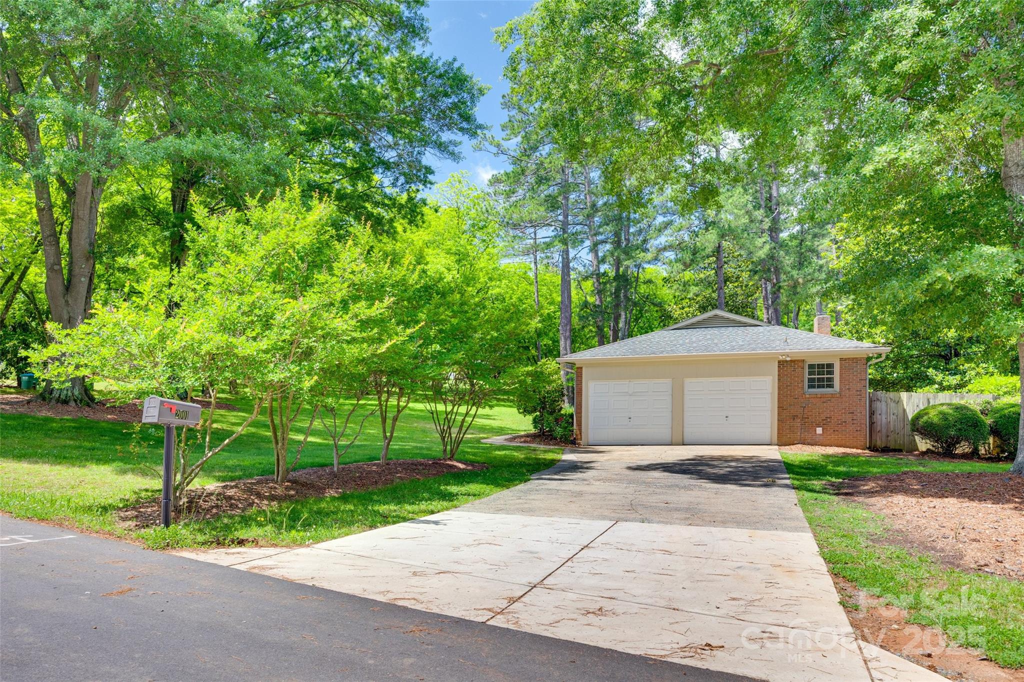 2001 Lakeview Drive Pineville, NC 28134 - Photo 35 of 35 a front view of a house with a yard and a garage