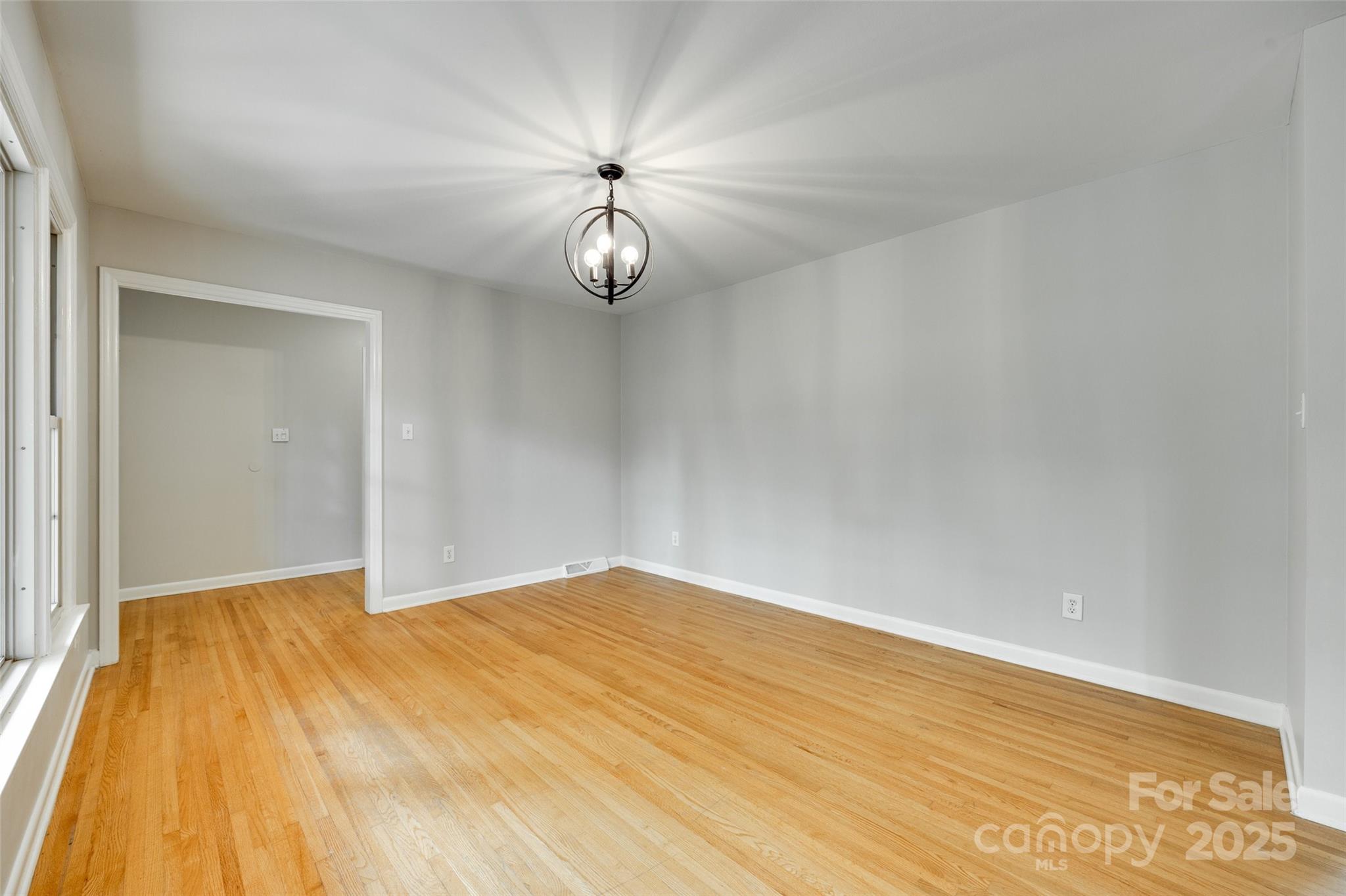 2001 Lakeview Drive Pineville, NC 28134 - Photo 5 of 35 a view of empty room with wooden floor