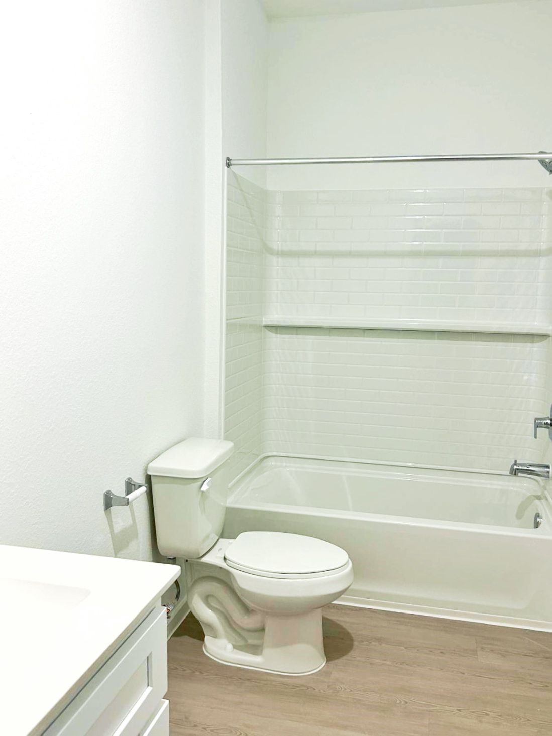 14973 Rustic Moon Road Conroe, TX 77302 - Photo 16 of 22 a white toilet sitting next to a bathroom sink