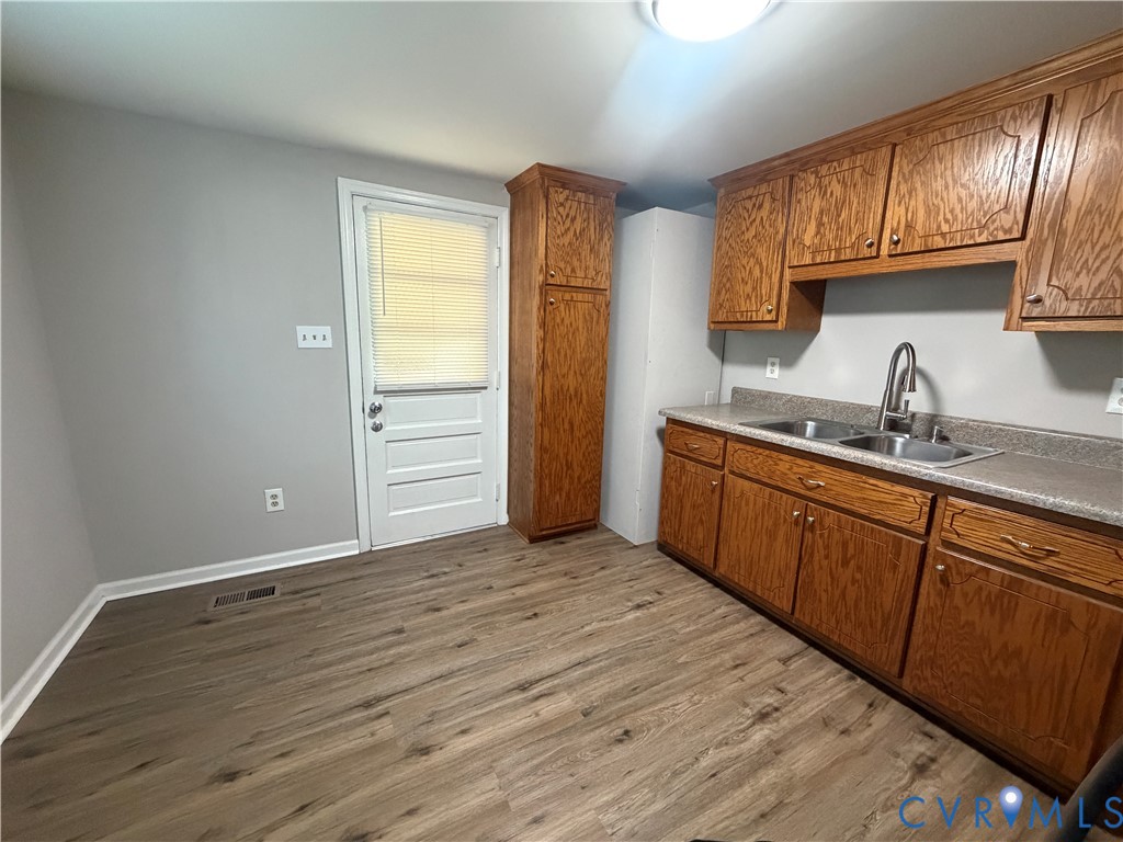 29 Spring Street Petersburg, VA 23803 - Photo 14 of 15 Wood-finish flooring, wood cabinetry, dual basin s