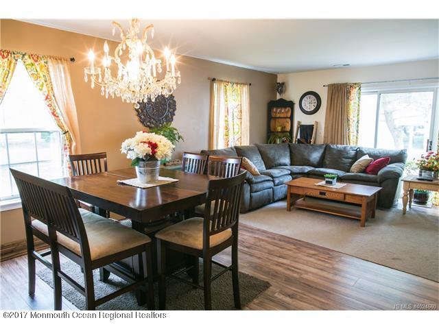 210 Osprey Court Tuckerton, NJ 08087 - Photo 2 of 24 a living room with furniture and a chandelier