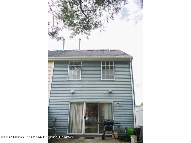 210 Osprey Court Tuckerton, NJ 08087 - Photo 22 of 24 a front view of a house with a tree