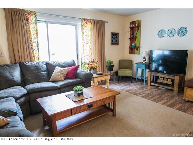 210 Osprey Court Tuckerton, NJ 08087 - Photo 5 of 24 a living room with furniture and a flat screen tv