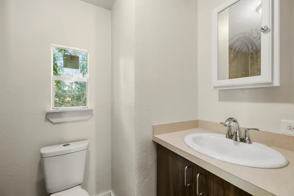 a bathroom with a sink and a toilet
