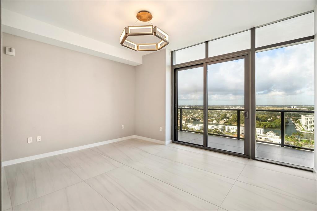 1116 North Ocean Boulevard, Unit UPH03 Pompano Beach, FL 33062 - Photo 54 of 84 a view of an empty room with a window