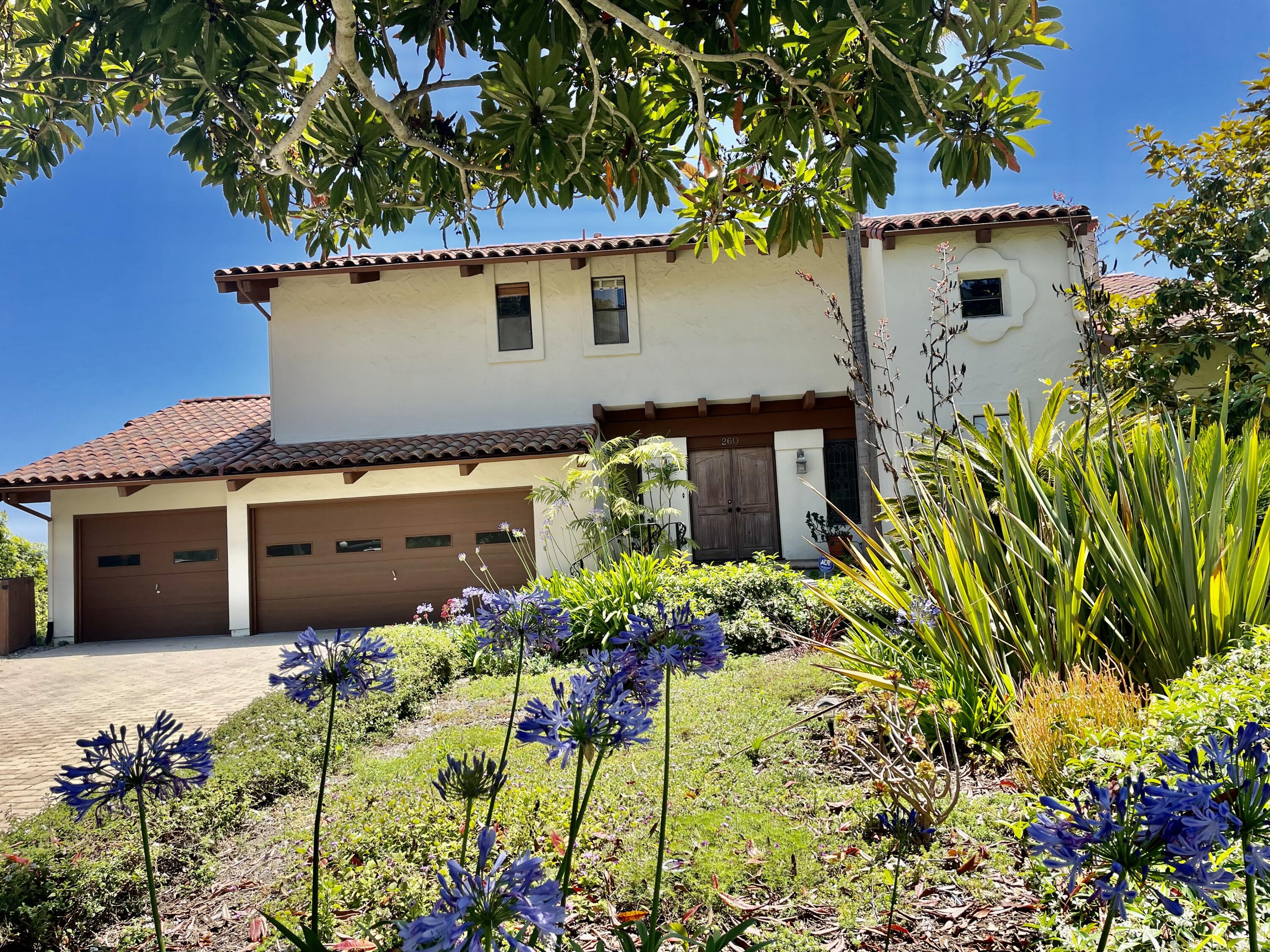 front view of a house with a big yard