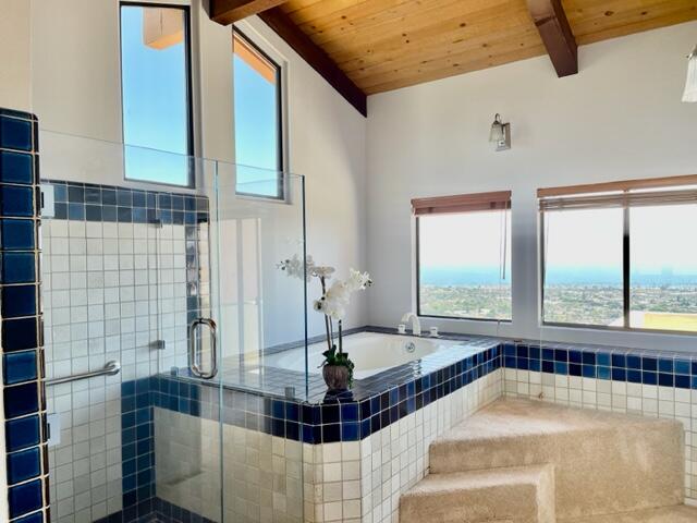 260 Loma Media Road Santa Barbara, CA 93103 - Photo 17 of 23 a view of a bathroom with tub and windows