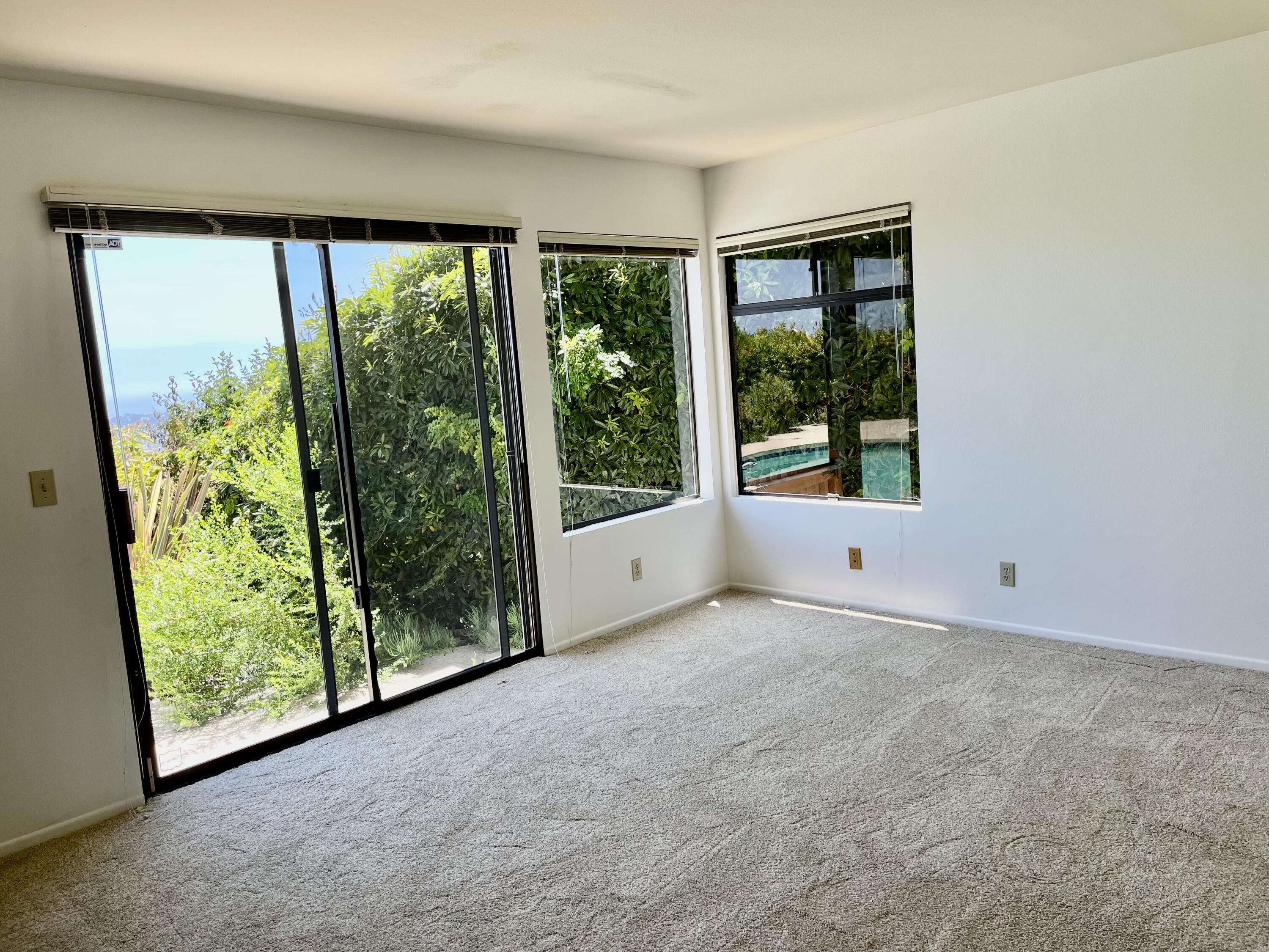 260 Loma Media Road Santa Barbara, CA 93103 - Photo 19 of 23 a view of a big room with an outdoor space and balcony