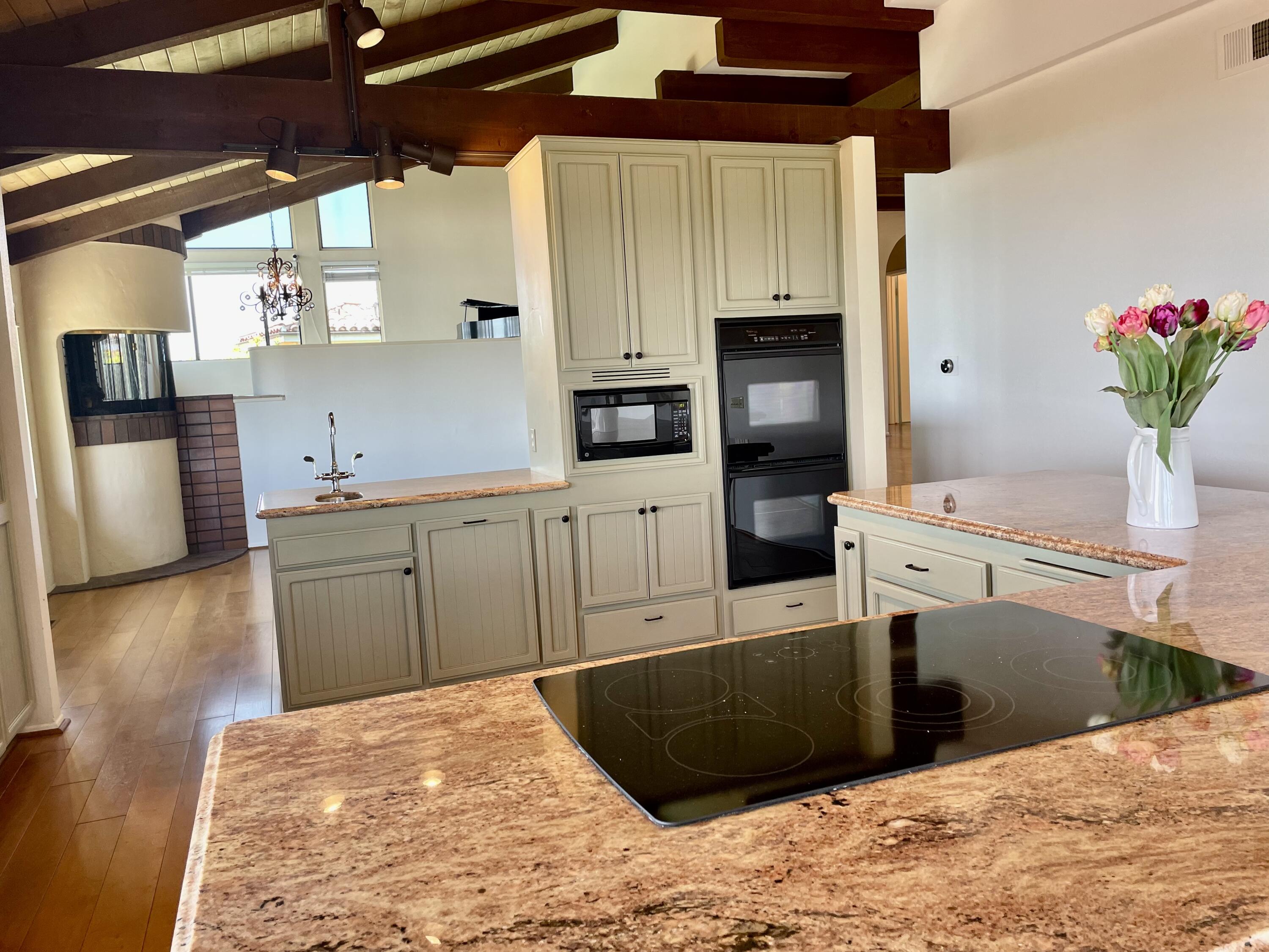 260 Loma Media Road Santa Barbara, CA 93103 - Photo 9 of 23 a kitchen with a refrigerator sink and stove