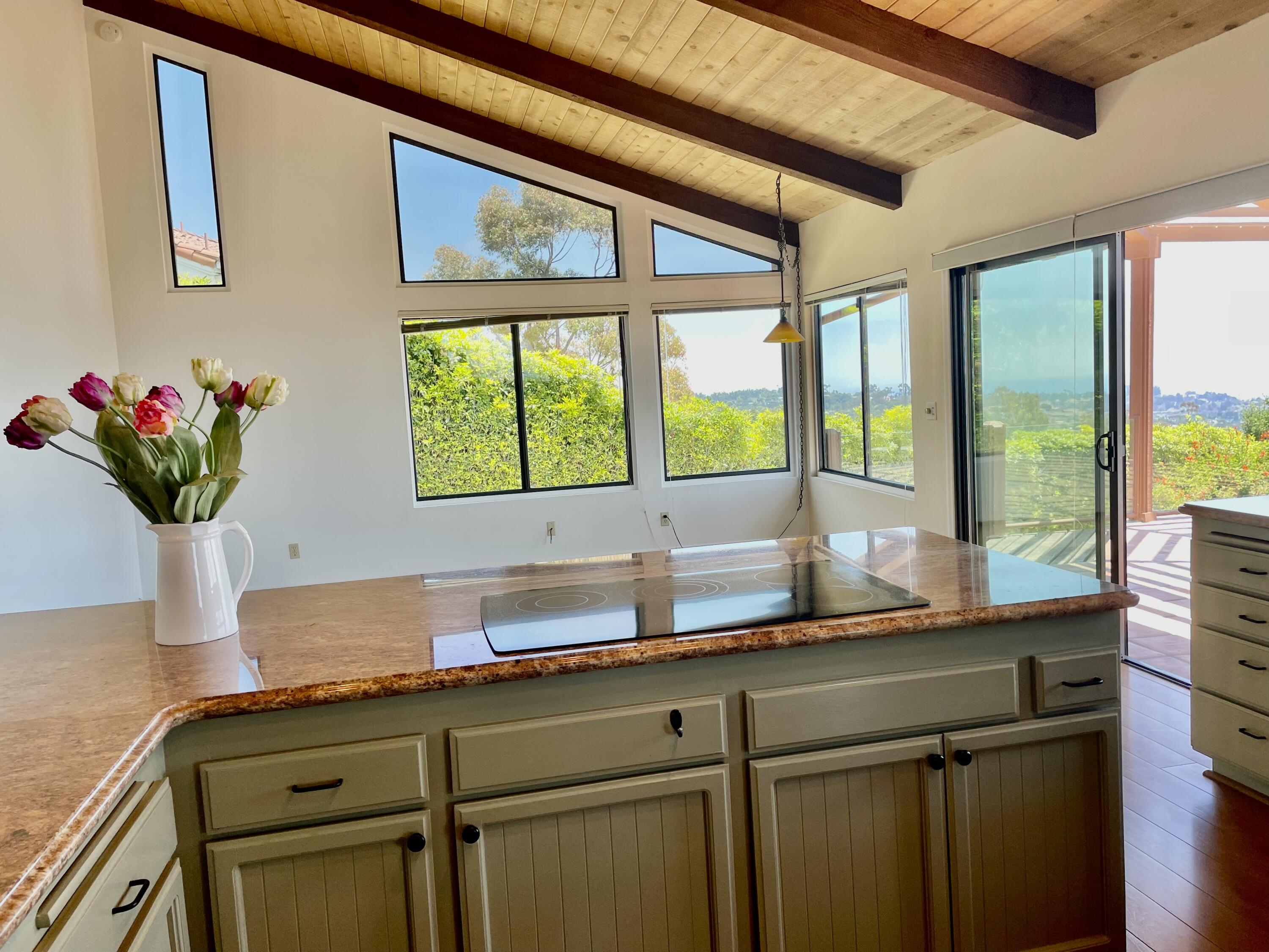 260 Loma Media Road Santa Barbara, CA 93103 - Photo 10 of 23 a kitchen with a sink and a large window
