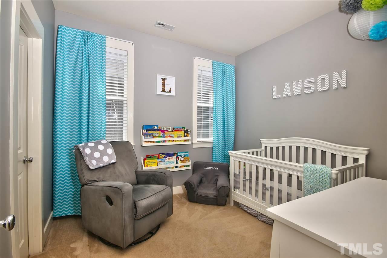 4522 All Points View Way Raleigh, NC 27614 - Photo 16 of 25 a bedroom with furniture and a window