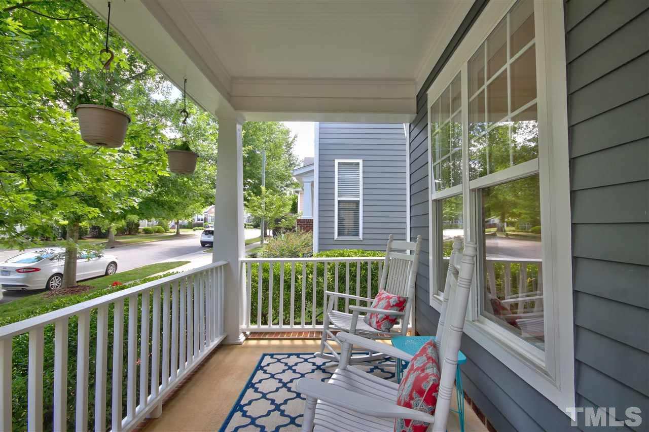 4522 All Points View Way Raleigh, NC 27614 - Photo 3 of 25 a view of a deck with wooden floor and outdoor seating