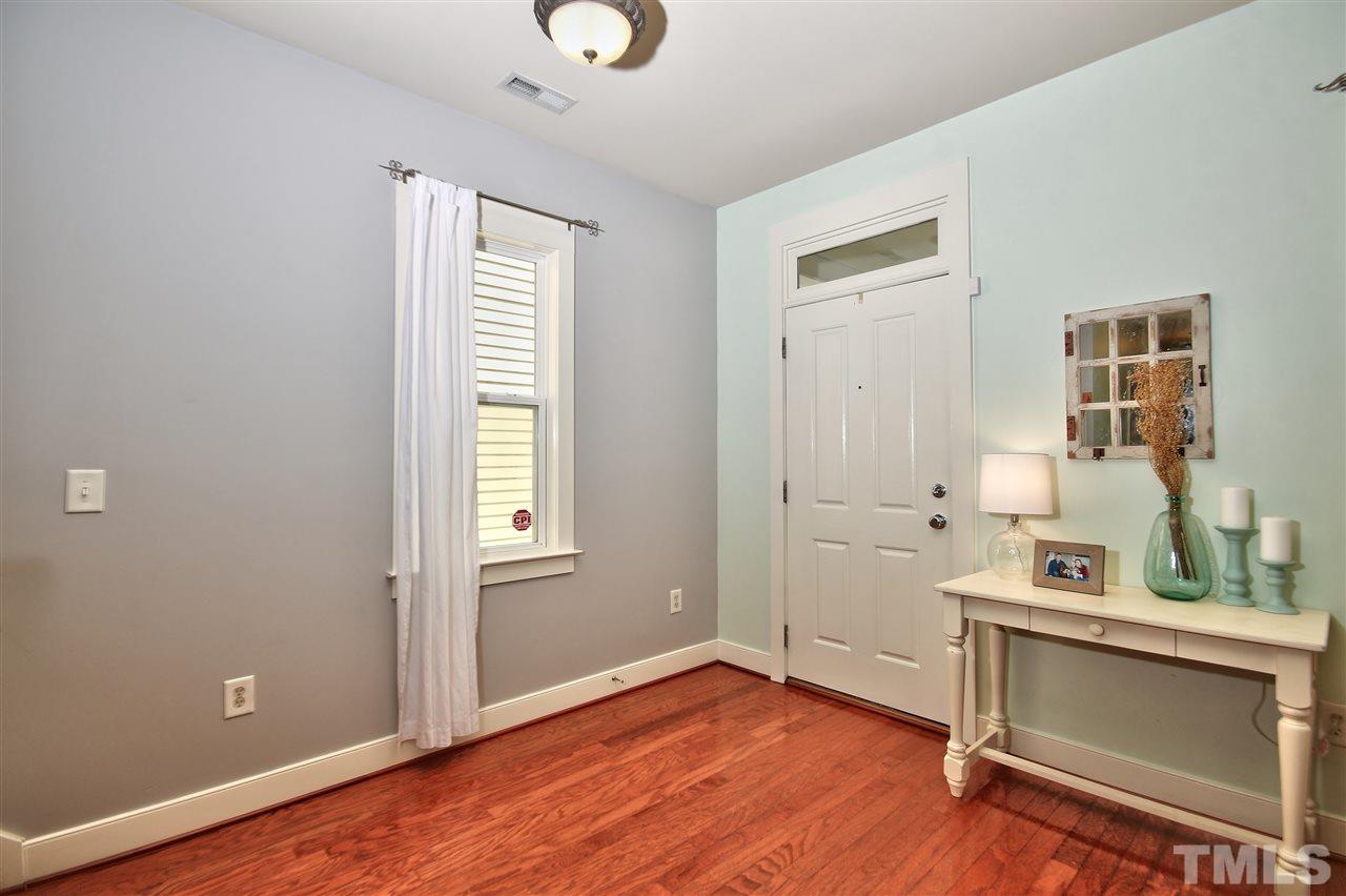 4522 All Points View Way Raleigh, NC 27614 - Photo 4 of 25 an empty room with windows and cabinet