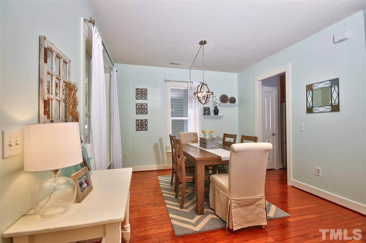 4522 All Points View Way Raleigh, NC 27614 - Photo 5 of 25 a view of a dining room with furniture window and wooden floor