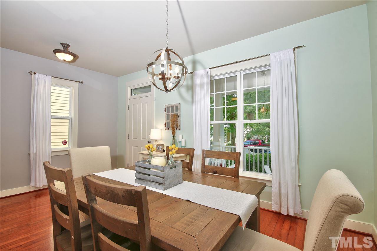 4522 All Points View Way Raleigh, NC 27614 - Photo 6 of 25 a view of a dining room with furniture window and wooden floor