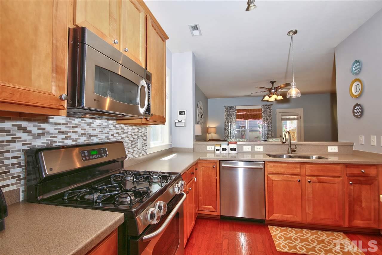 4522 All Points View Way Raleigh, NC 27614 - Photo 8 of 25 a kitchen with stove and cabinets