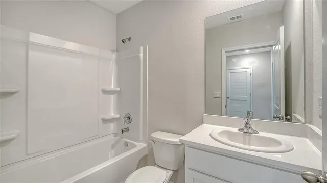 a view of a chairs in back yard