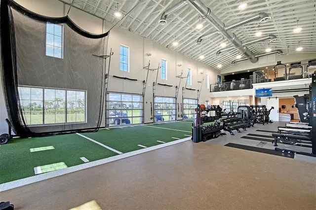 a view of swimming pool with seating space