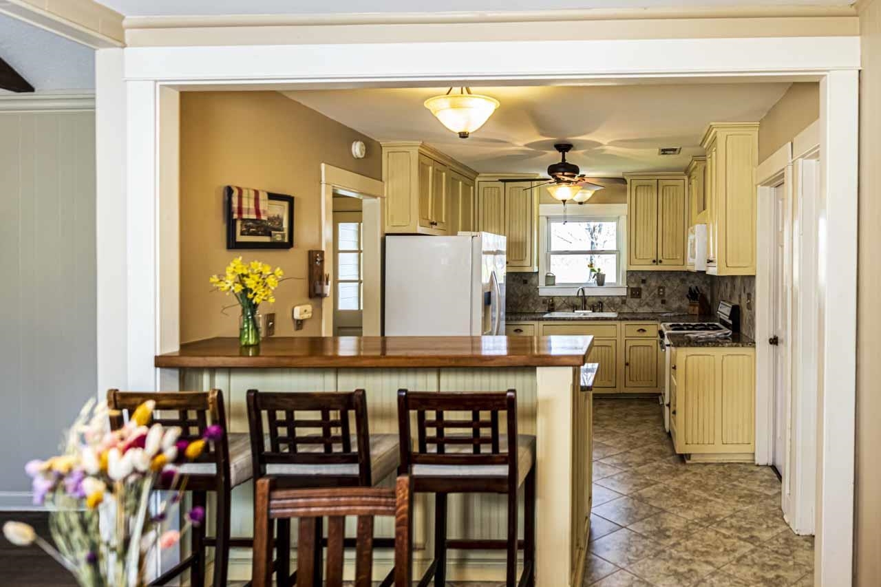6746 Old Millington Road Millington, TN 38053 - Photo 11 of 40 a kitchen with furniture and window