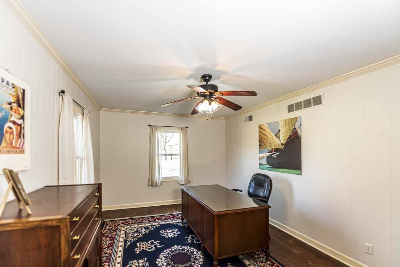 6746 Old Millington Road Millington, TN 38053 - Photo 21 of 40 Office space with ceiling fan, dark wood-style floors, ornamental molding, and wood walls