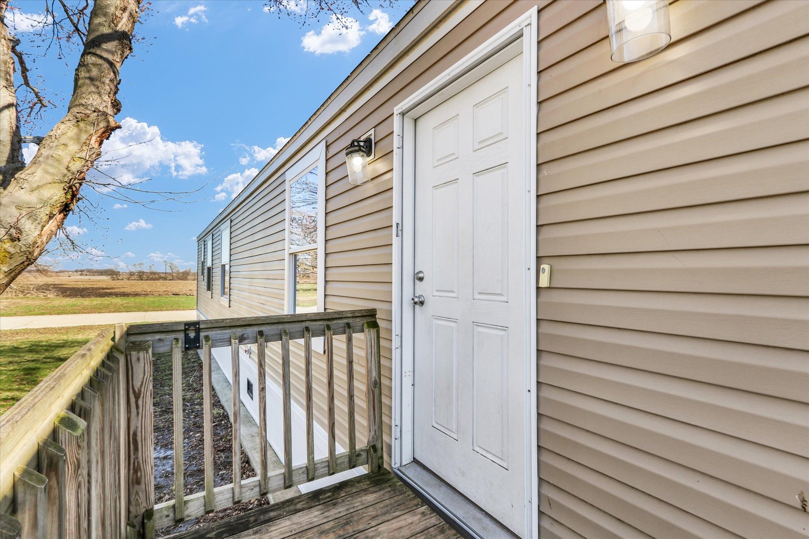 1205 Wedgewood Drive Rantoul, IL 61866 - Photo 11 of 31 a view of a balcony with wooden floor