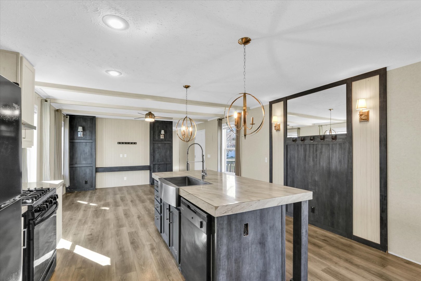 1205 Wedgewood Drive Rantoul, IL 61866 - Photo 17 of 31 a kitchen with a sink a counter top space and stainless steel appliances