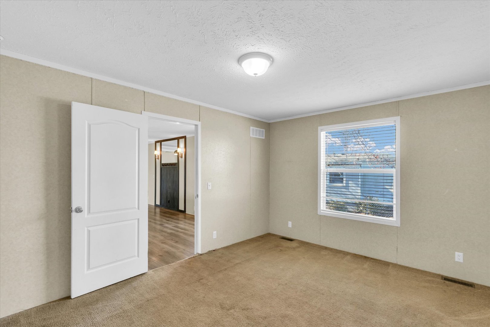 1205 Wedgewood Drive Rantoul, IL 61866 - Photo 20 of 31 a view of an empty room with a window
