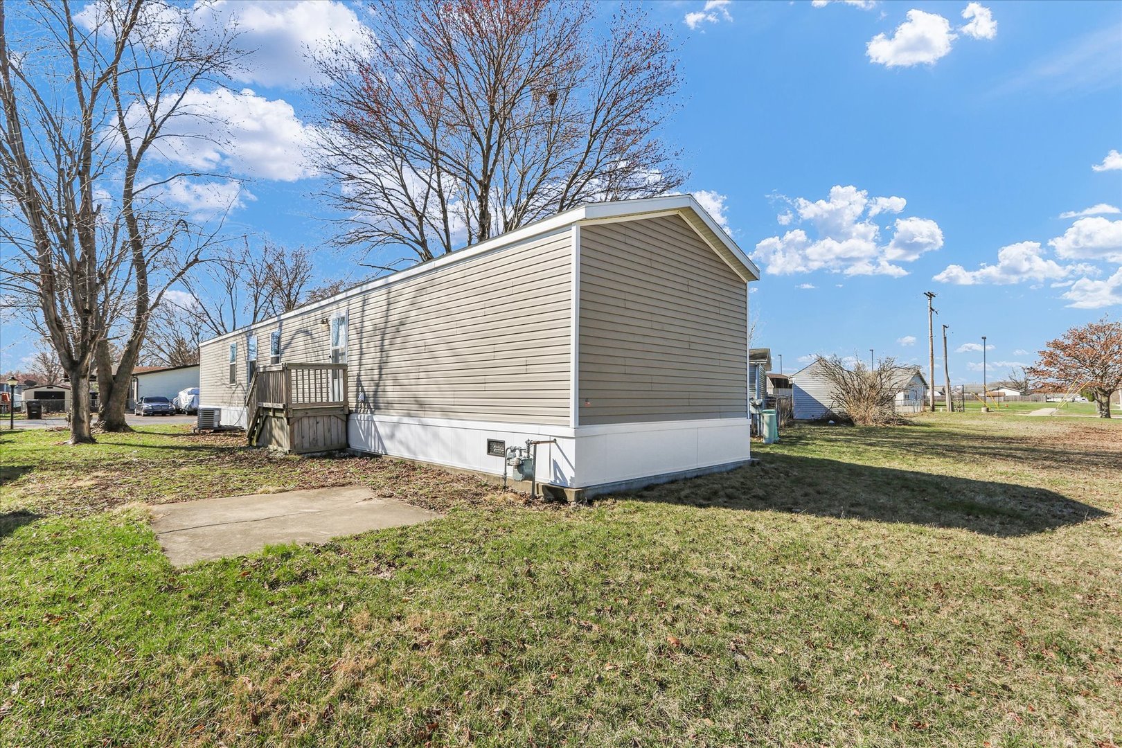 1205 Wedgewood Drive Rantoul, IL 61866 - Photo 28 of 31 a view of a house with a yard