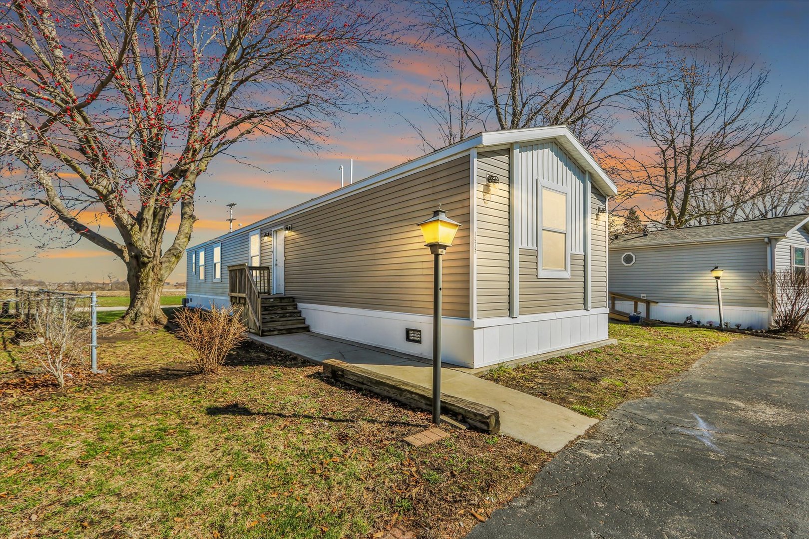 1205 Wedgewood Drive Rantoul, IL 61866 - Photo 7 of 31 a view of a house with snow on the road