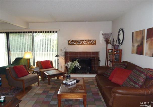 Light and bright living room with fireplace