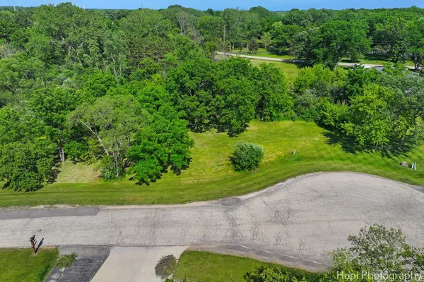 a view of a garden with a building