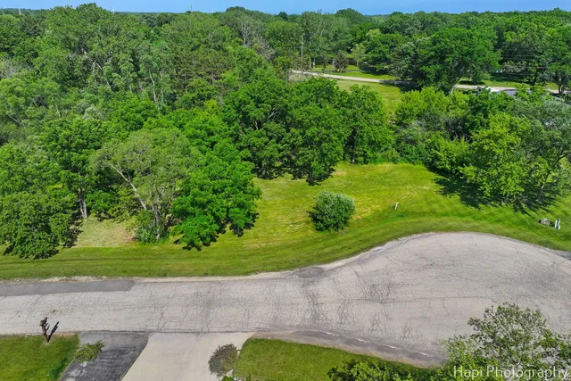 a view of a garden with a building