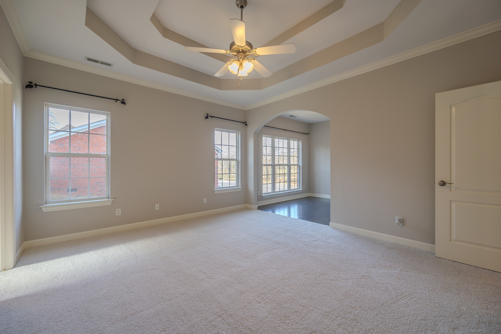 3545 Rock Springs Road Smyrna, TN 37167 - Photo 11 of 23 an empty room with chandelier fan and windows