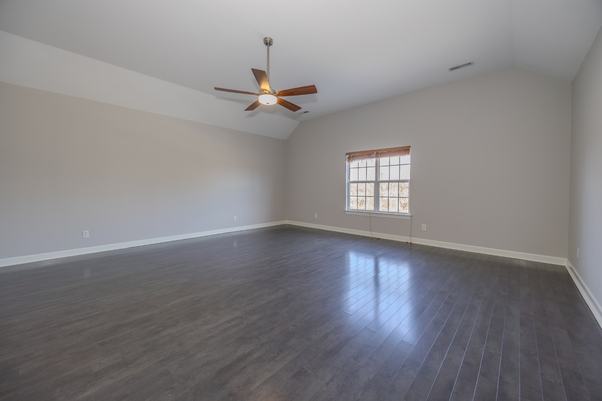 3545 Rock Springs Road Smyrna, TN 37167 - Photo 20 of 23 an empty room with wooden floor window and ceiling fan