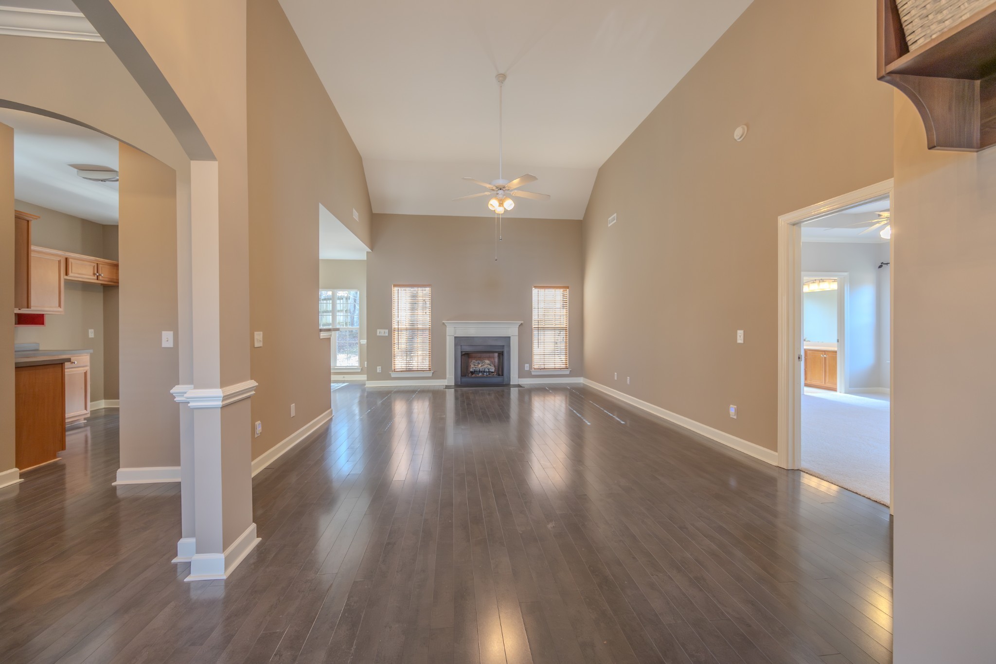 3545 Rock Springs Road Smyrna, TN 37167 - Photo 3 of 23 a view of an empty room with wooden floor and a window
