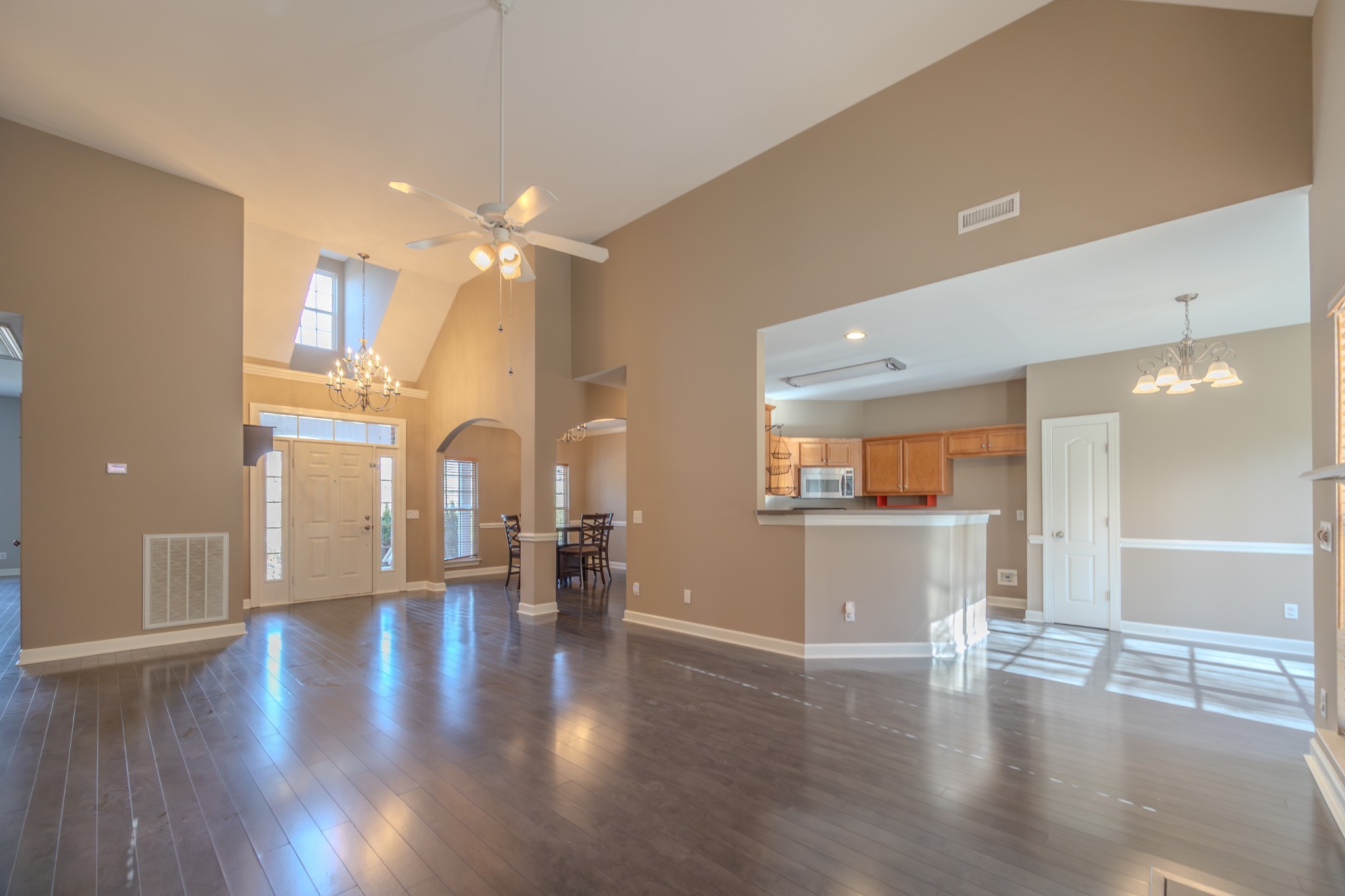 3545 Rock Springs Road Smyrna, TN 37167 - Photo 5 of 23 a view of empty room with wooden floor and windows