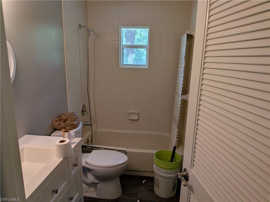 17191 Frank Road Alva, FL 33920 - Photo 17 of 27 a bathroom with a toilet and a sink