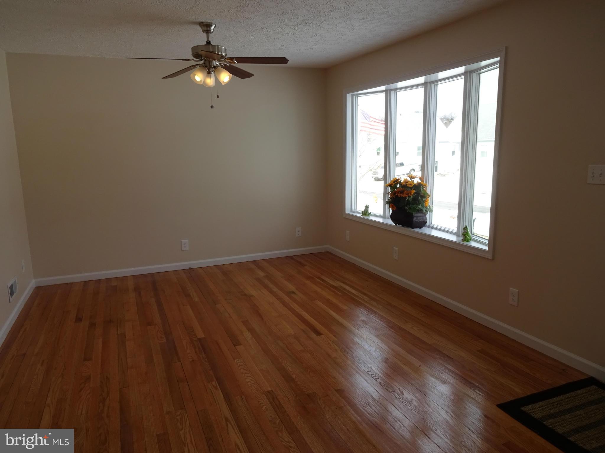 1614 Leslie Road Baltimore, MD 21222 - Photo 3 of 22 Living Room w/ Wood Floors
