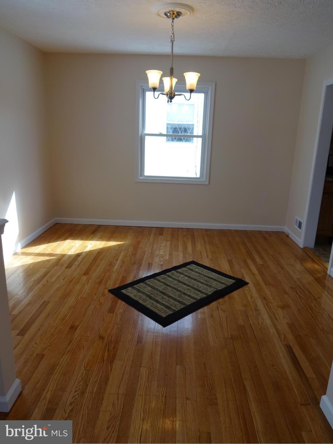 1614 Leslie Road Baltimore, MD 21222 - Photo 4 of 22 Dining Room w/ Refinished Wood Floors