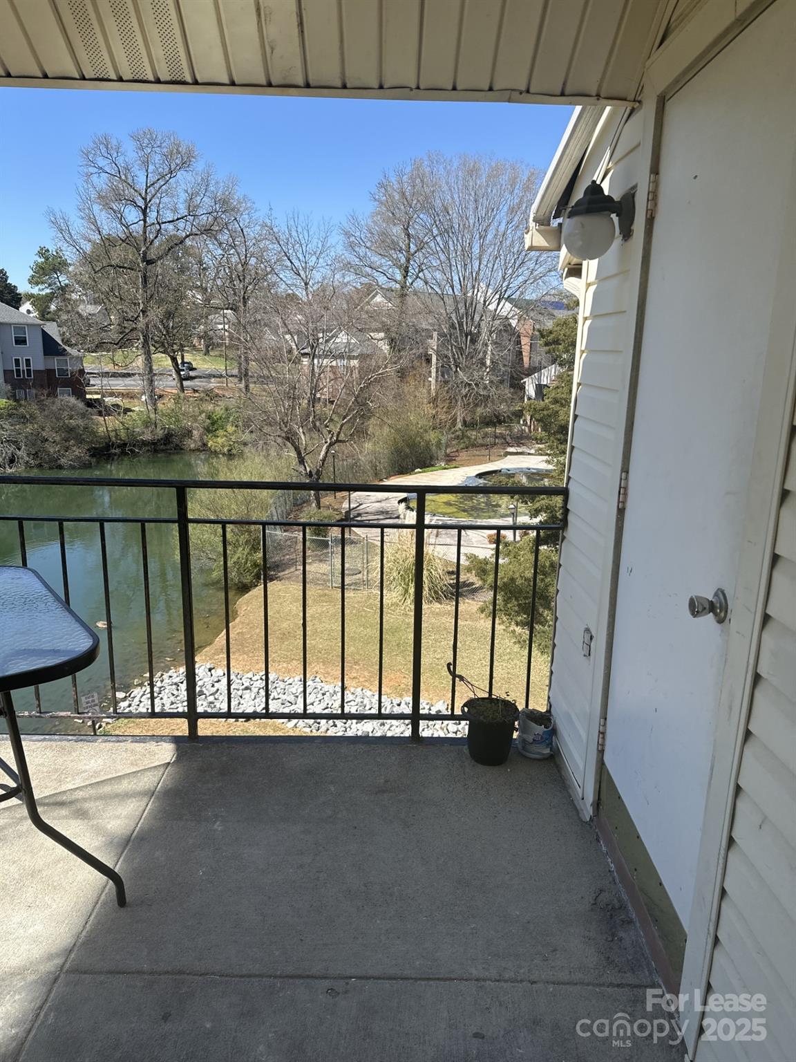 4816 Spring Lake Drive, Unit E Charlotte, NC 28212 - Photo 8 of 14 a view of a balcony